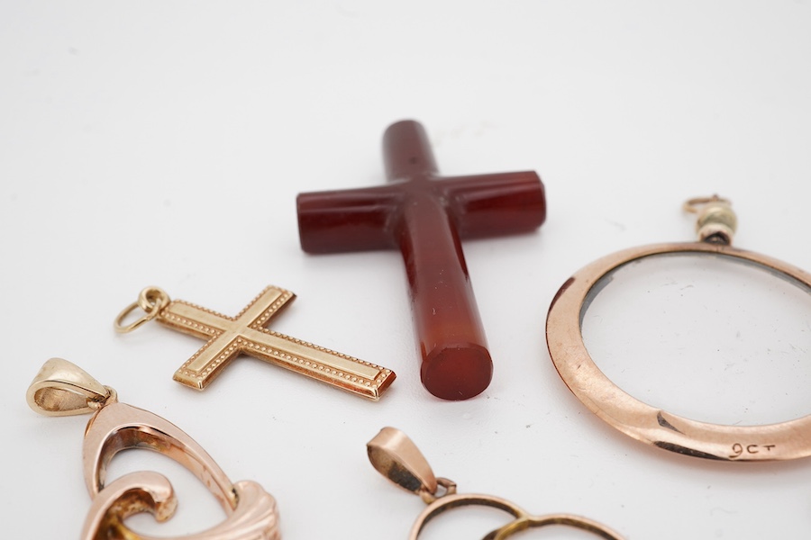 Six assorted pendants including carnelian cross, a 9ct, opal and garnet? and two other 9ct and gem set. Condition - fair